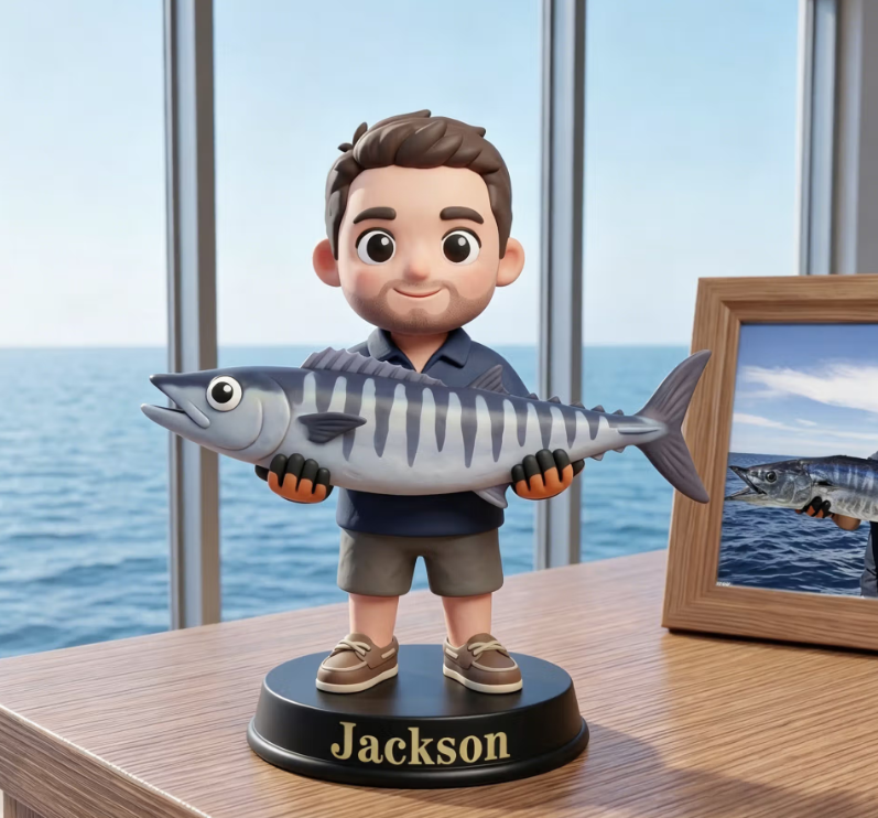 Föreviga fiskeäventyren på skrivbordet med en personlig 3D fiskarstaty med eget foto och text